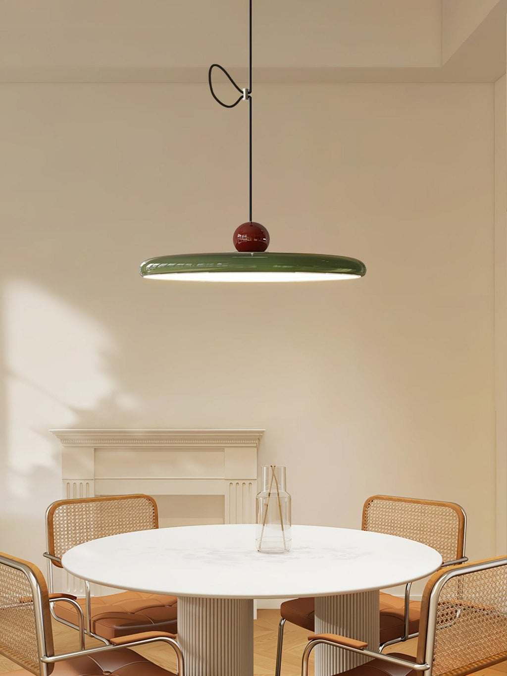 Red and beige swing arm pendant light with lit acrylic disc