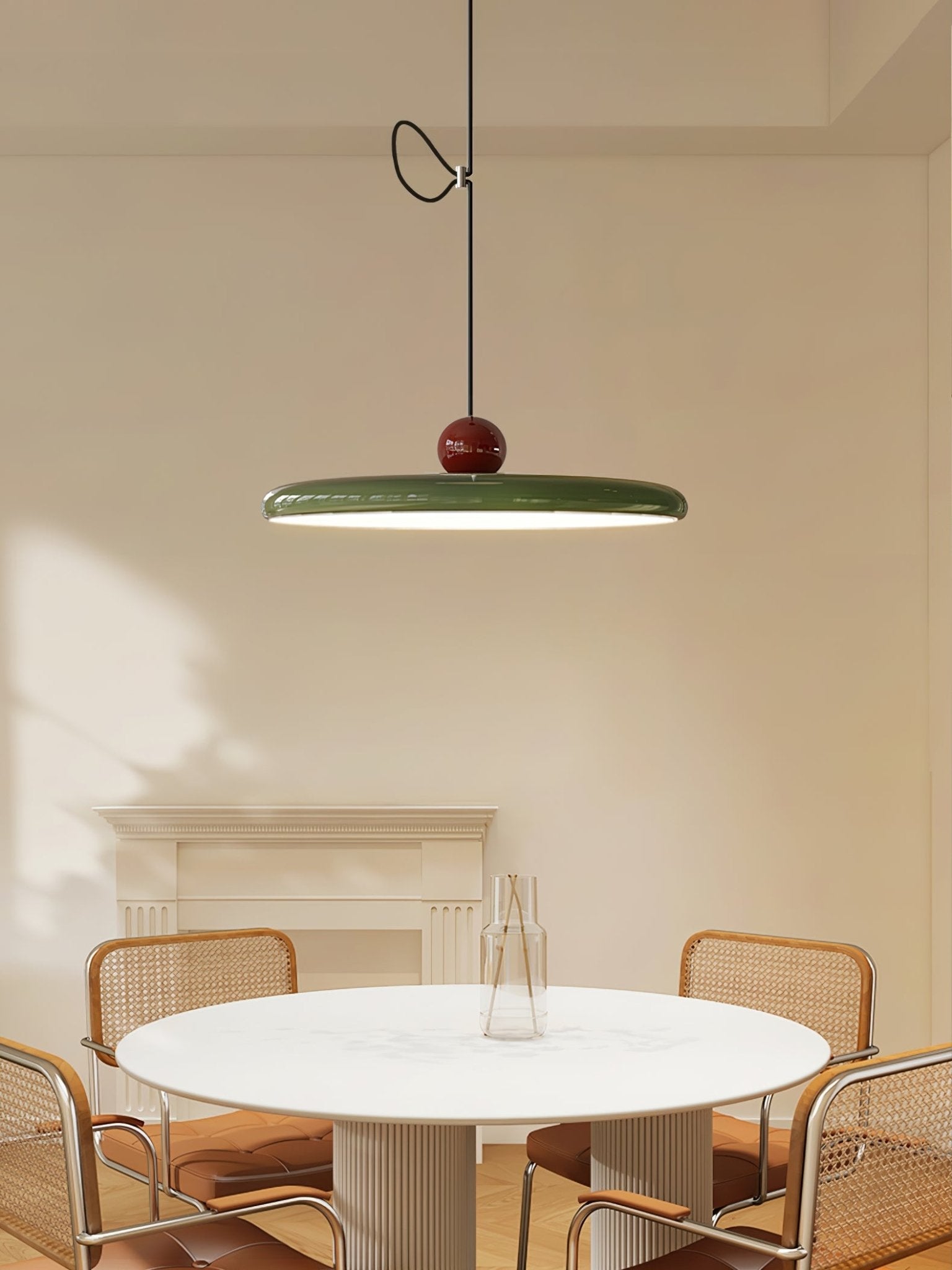 Red and beige swing arm pendant light with lit acrylic disc