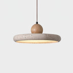 Travertine disc pendant light showing natural stone surface texture