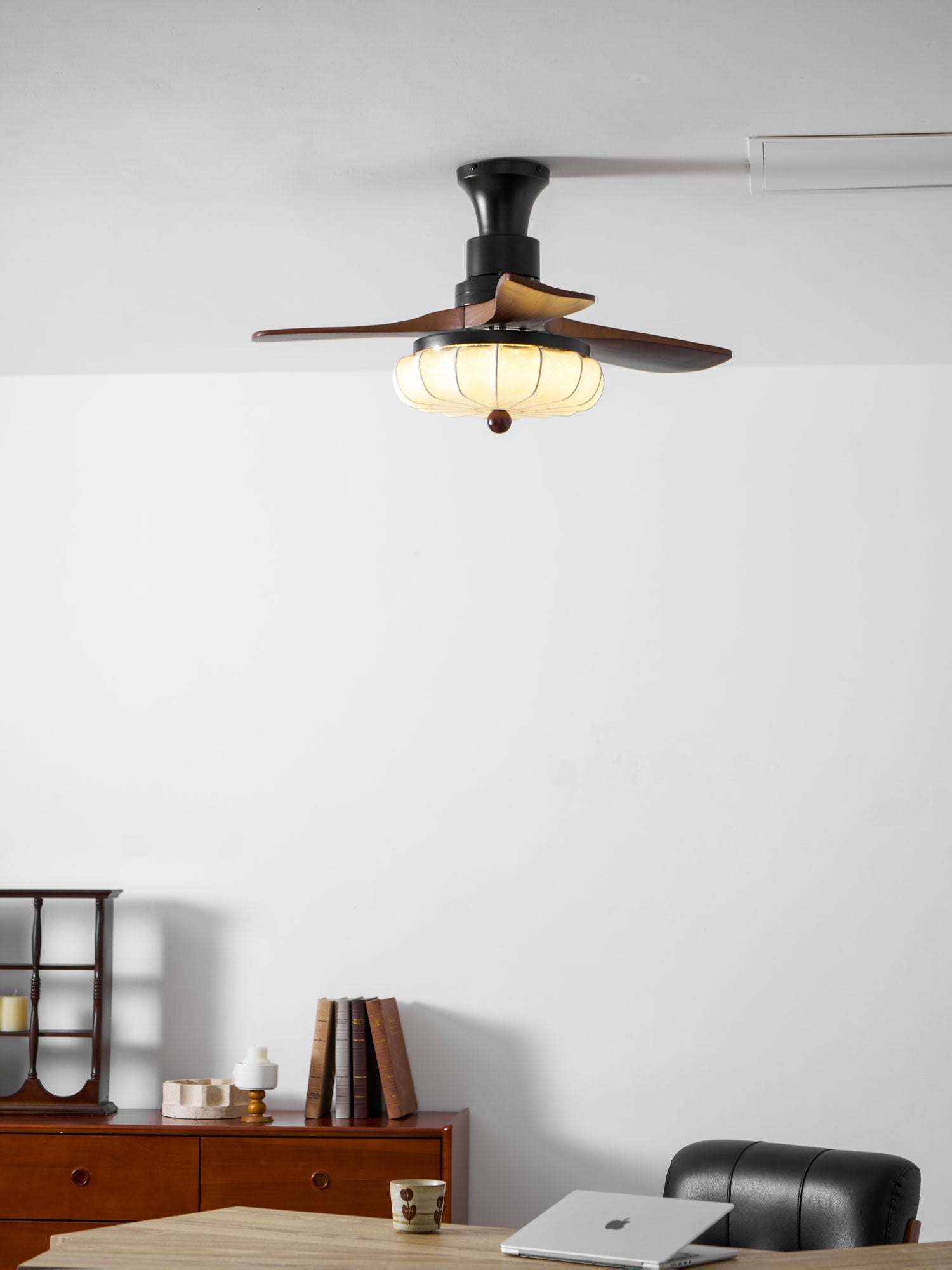 Lotus Bloom ceiling fan light shown in a furnished interior