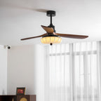 Ceiling fan with walnut blades shown spinning under the shade