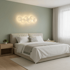 White ceramic lotus petal wall lamp with warm glow