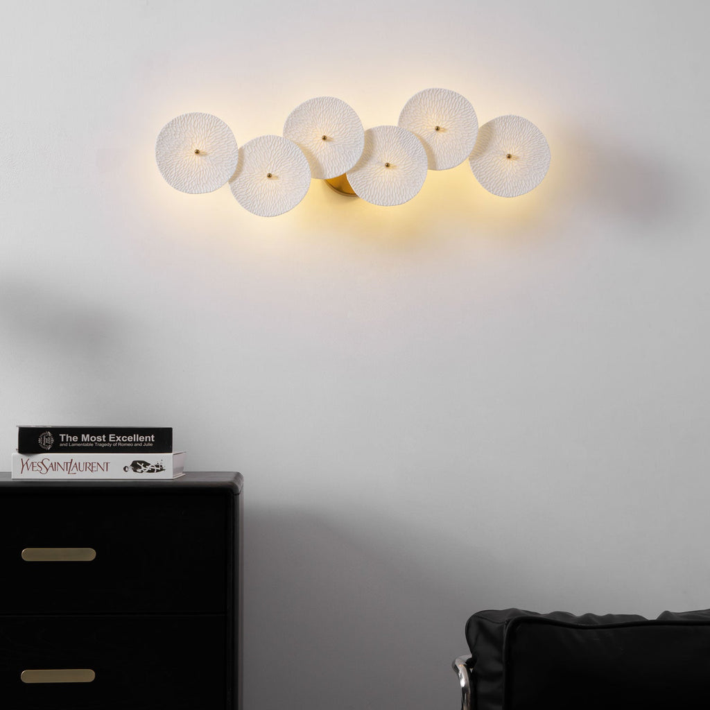 Tall lotus petal wall lamp in white ceramic and gold