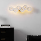 Tall lotus petal wall lamp in white ceramic and gold