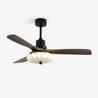 Ceiling fan light with warm LED glow through the fabric lotus shade