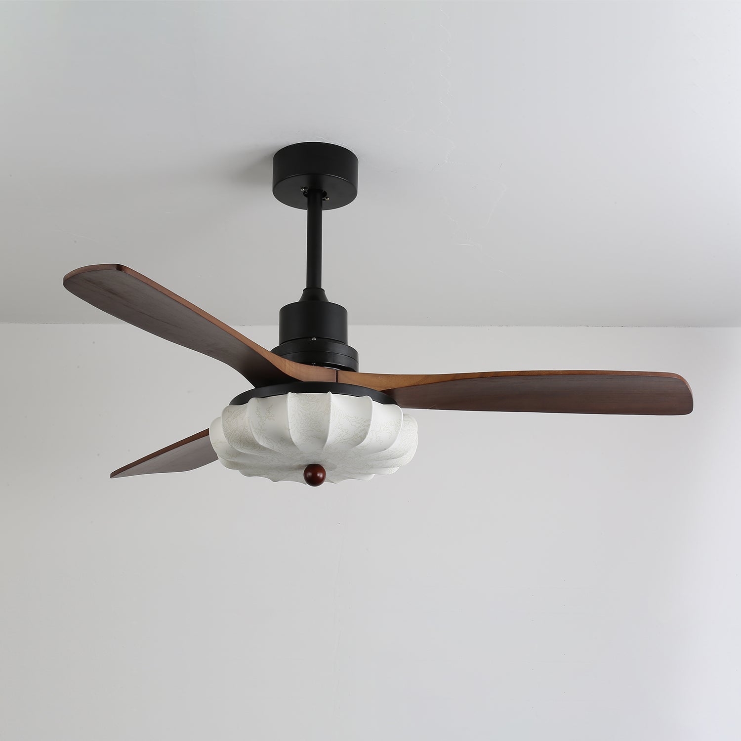 Ceiling fan with printed lotus shade in a contemporary interior