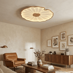 Lotus leaf ceiling light natural wood-grain finish shown lit