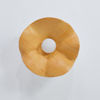 Black walnut leaf ceiling light with sculptural curves and glow