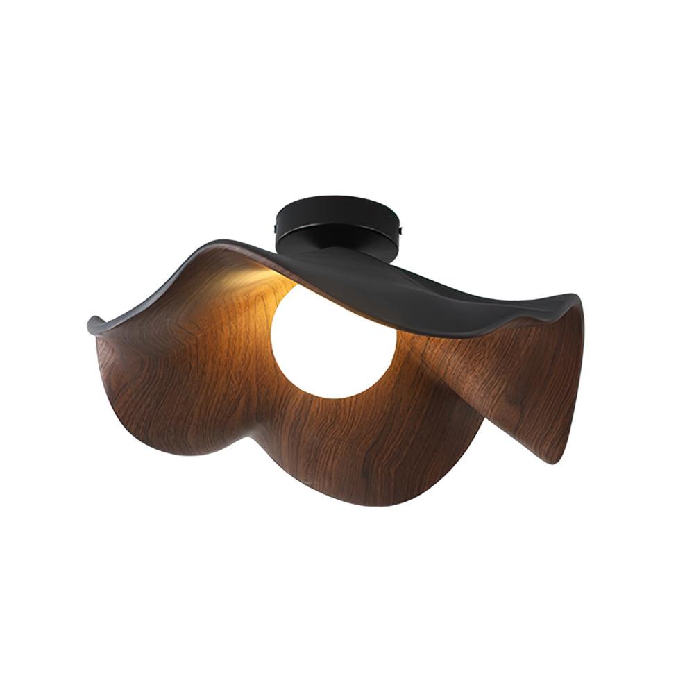 Layered leaf-shaped ceiling light in wood-grain finish on a ceiling