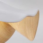 Leaf-shaped ceiling light in wood-grain finish lit from within