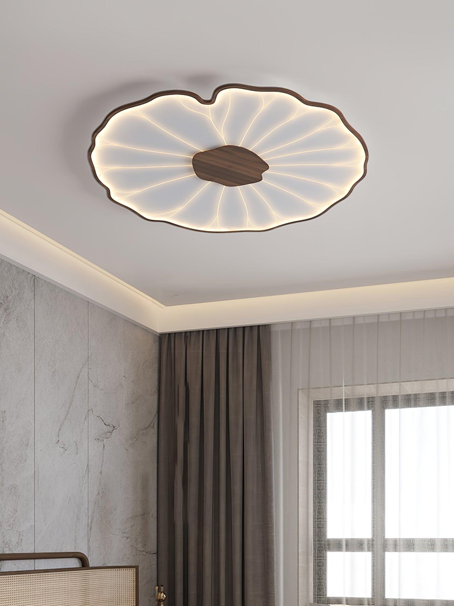 Lotus leaf ceiling light leaf form viewed from below glowing