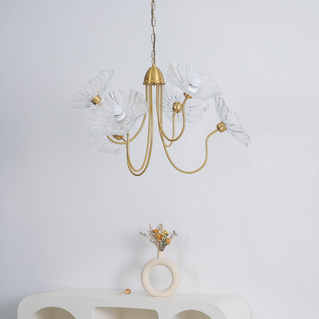 Frosted glass leaf shades on a gold chandelier frame