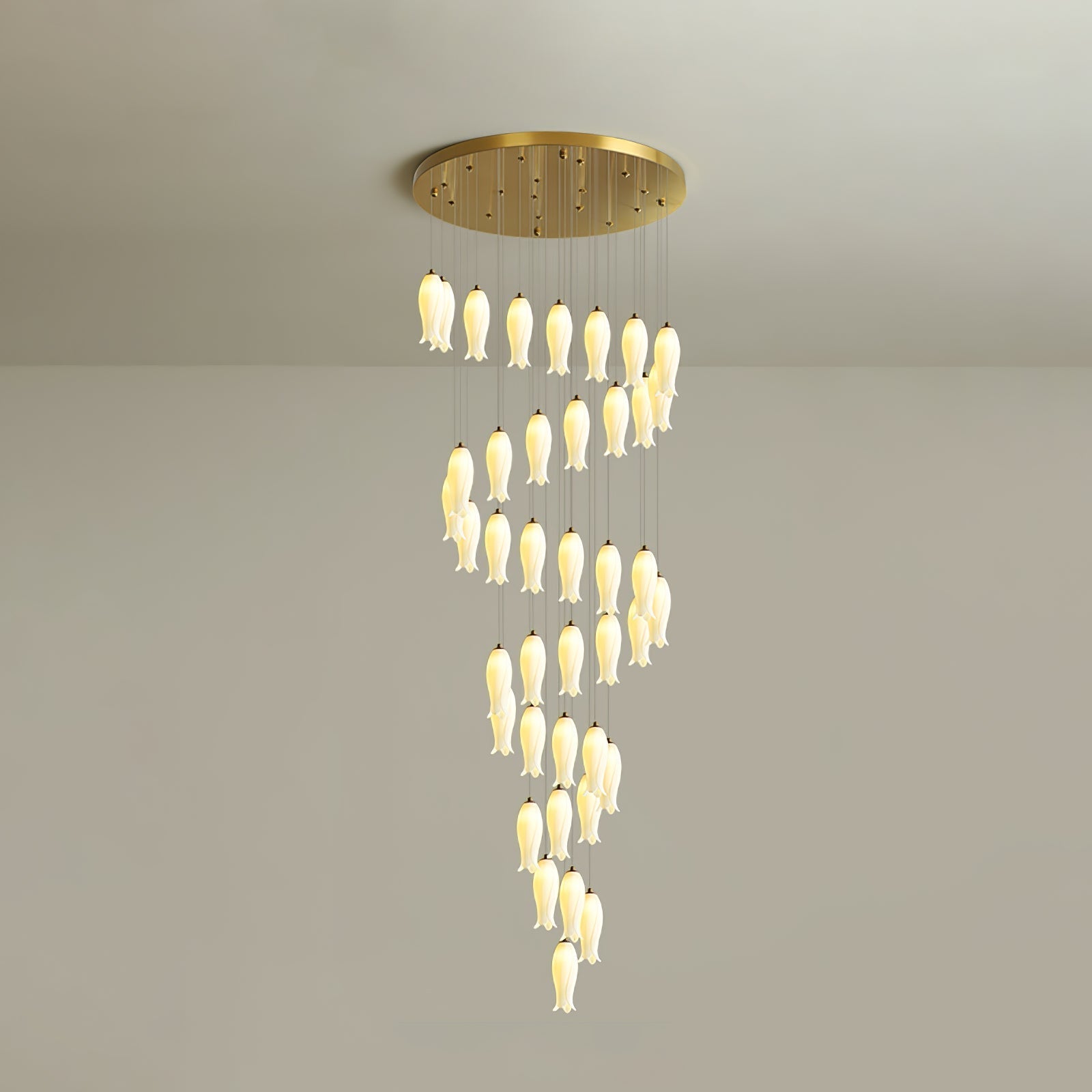 Forty-light Sylirion in the taller drop, a long spiral cascade of ceramic shades for a high stairwell