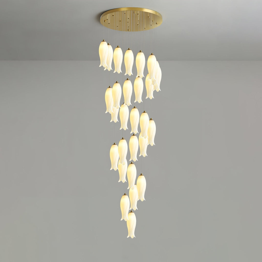 Sylirion lit against a grey studio wall, shades spiralling down from the round gold ceiling plate
