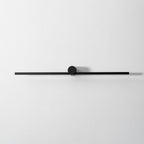 Studio shot of an unlit Clérachic wall light, shown front-on against a plain grey backdrop.