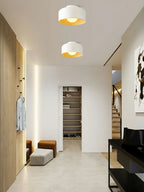 Globe ceiling light glowing softly in a nook