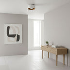 White glass globe light glowing on a landing