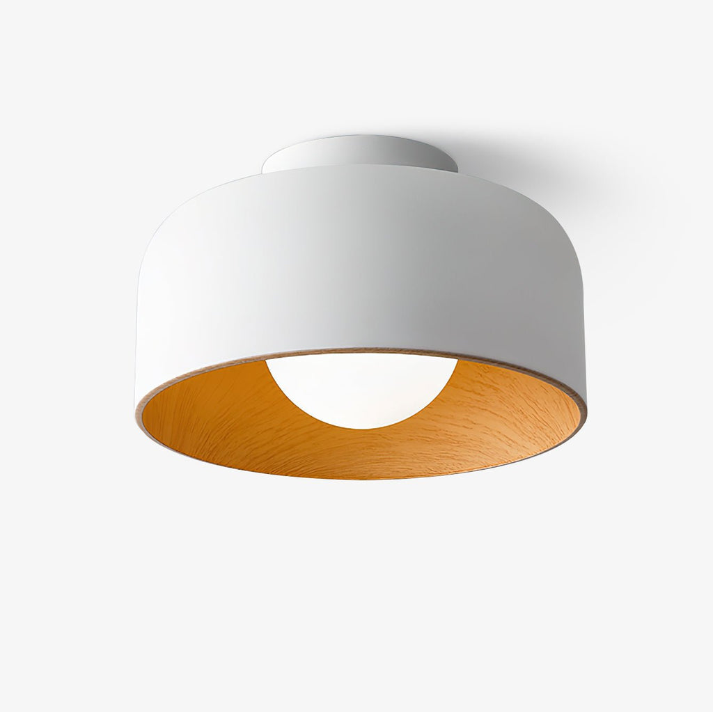 White glass globe light with warm interior glow