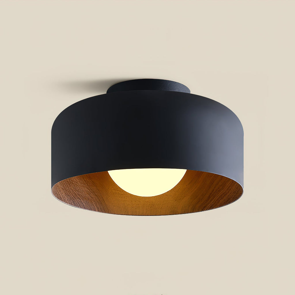 White glass globe ceiling light with a wood-grain interior