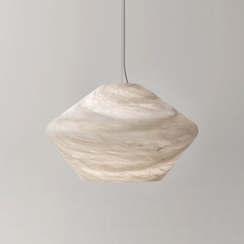 The Tyler pendant's faceted shade in ivory alabaster, cropped square to show its soft cloudy veining unlit.