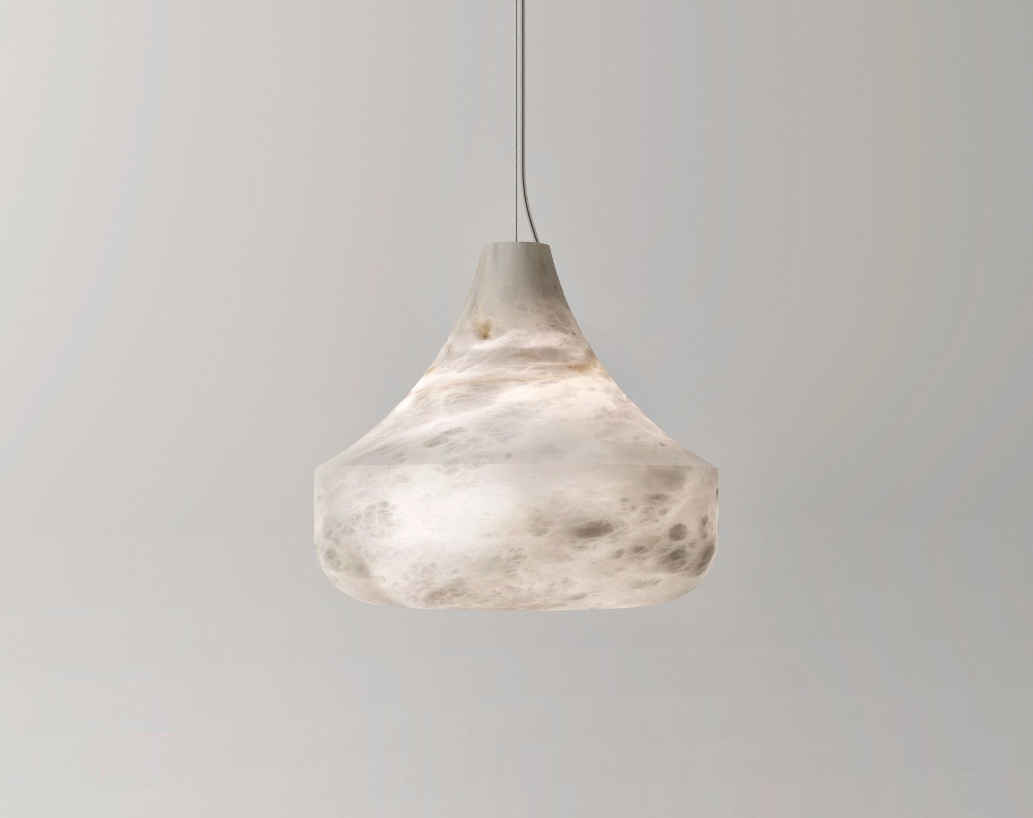 The Tyler pendant's bell-shaped alabaster shade against a soft grey wall, showing cool grey mottling in the stone.