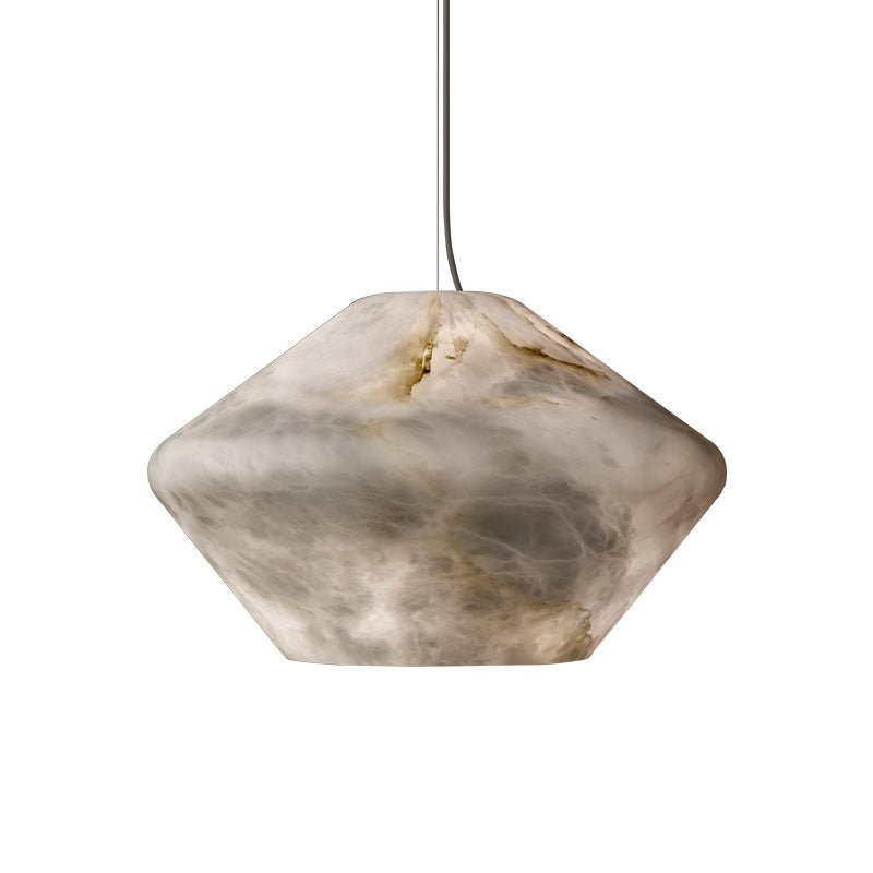 Close crop of the Tyler pendant's faceted alabaster shade on white, filling the frame to show its stone veining.