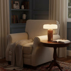 Marble table lamp on a sideboard with warm light