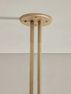 Detail of the Clérachic brass ceiling canopy, showing the two brushed rods bolted into the round mount.