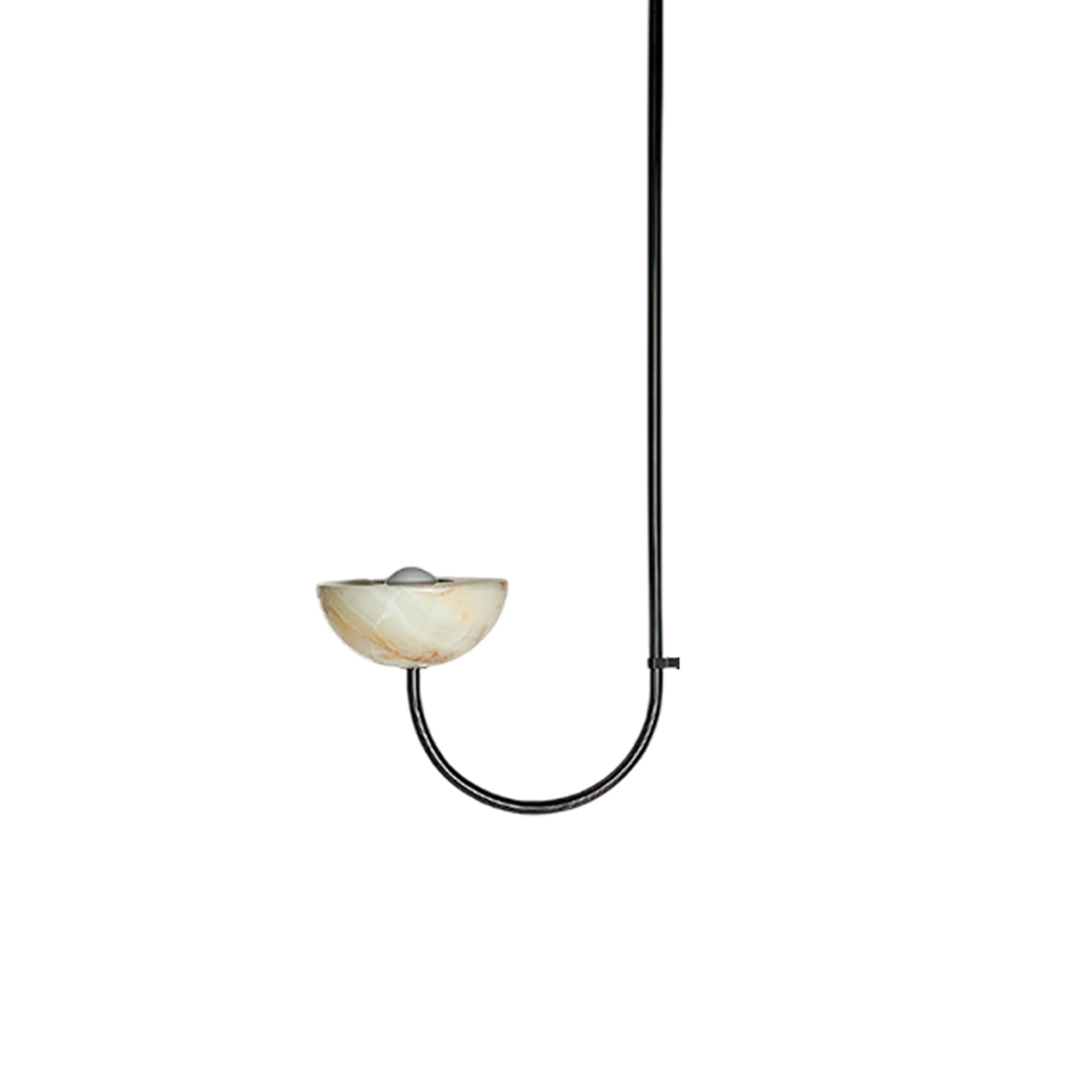 Clérachic single-arm Lunaris pendant in black, close enough to see the bulb resting inside the jade bowl.