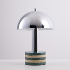 Taller studio crop of the Clérachic lamp straight-on and unlit, more backdrop visible above the dome.
