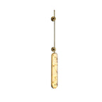 The brass version on white with a longer rod drop, alabaster panel glowing at the base.