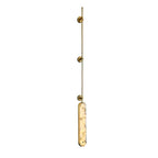 The tallest brass version on white, the rod running the full height above the lit panel.