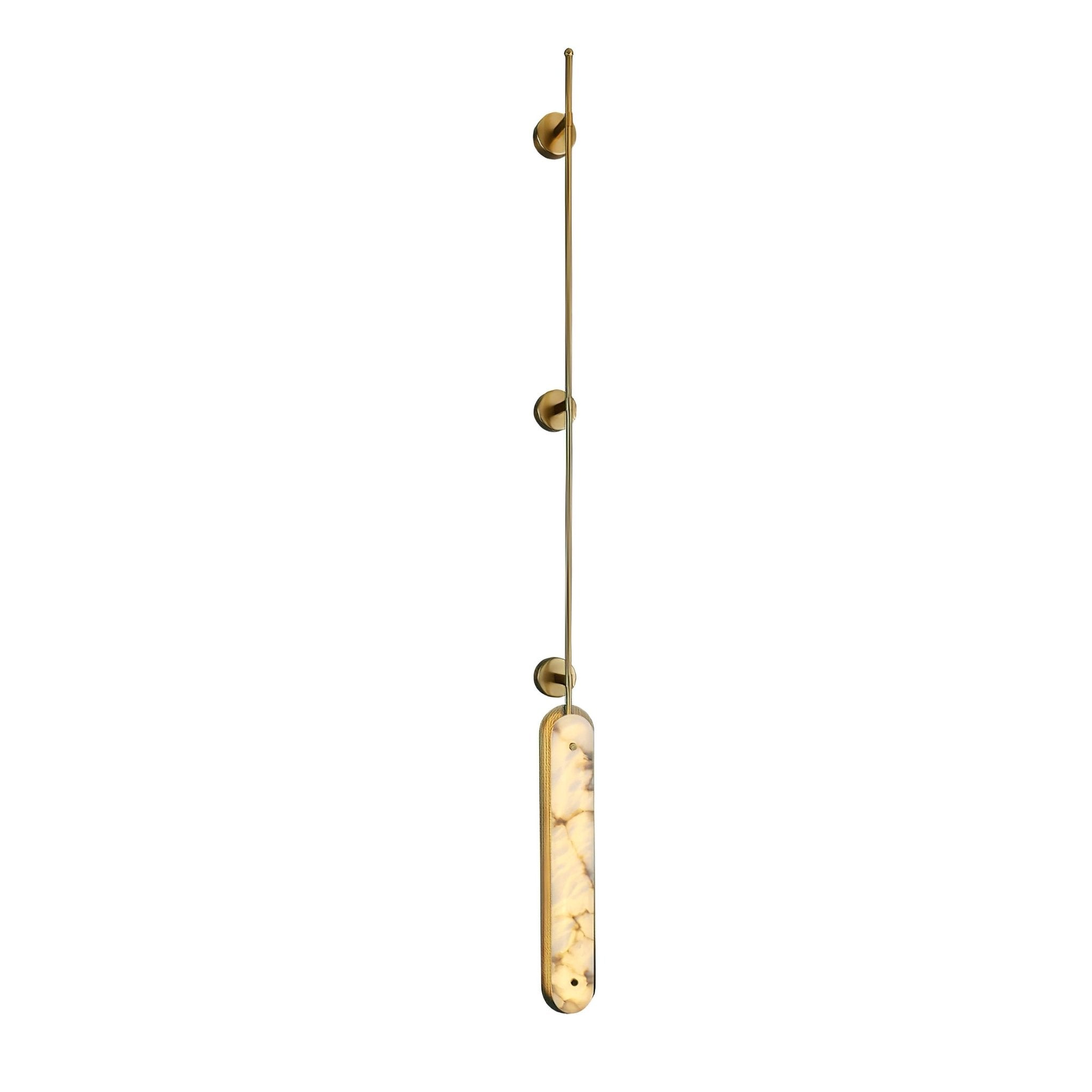 The tallest brass version on white, the rod running the full height above the lit panel.