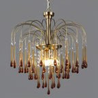 The widest tiers of caramel crystal drops on this Clérachic pendant fan out fully, lit against dark grey.