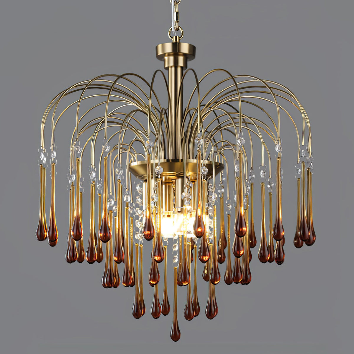 The widest tiers of caramel crystal drops on this Clérachic pendant fan out fully, lit against dark grey.