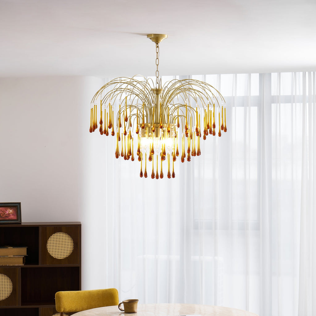 This Clérachic pendant's caramel crystal drops hang beside sheer curtains and a dark wood cane-panelled cabinet.