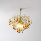 Set against plain white, this Clérachic pendant's caramel crystal drops catch a warm glow.