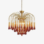 Product shot of this Clérachic chandelier isolated on white, caramel crystal drops cascading from curved gold-finish arms.
