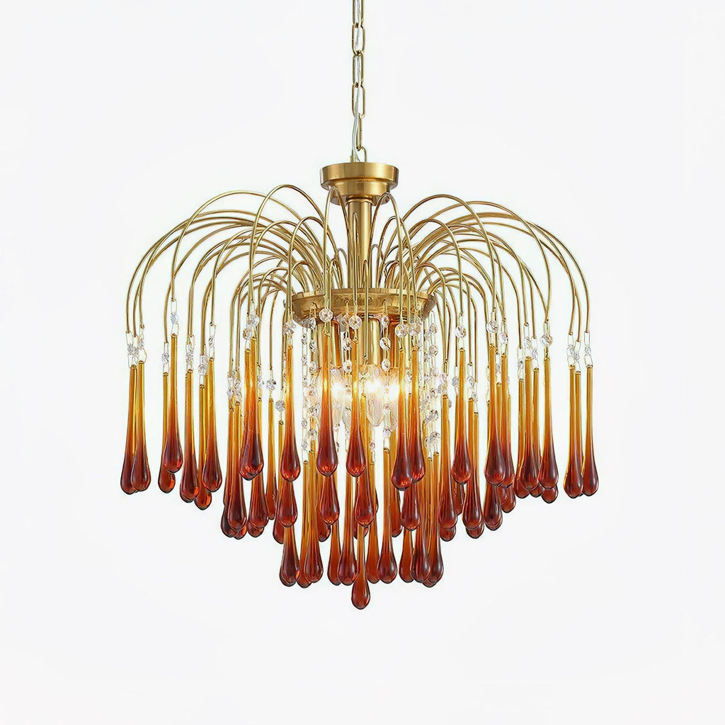 Caramel crystal drops fan out beneath brass arms on this Clérachic chandelier, shown isolated on a plain background.
