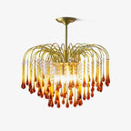 The flush-mount version of this Clérachic chandelier sits close to the ceiling, its caramel crystal drops catching the light.