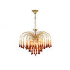 This Clérachic pendant's caramel crystal drops are shown isolated on white in natural daylight.