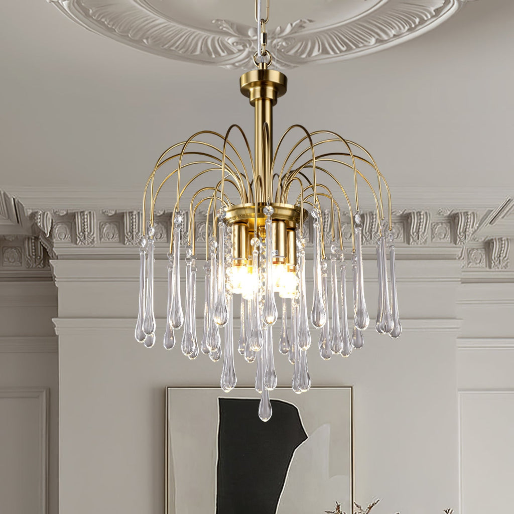 This Clérachic pendant's clear crystal drops hang beside ornate white cornicing and a framed piece of art.
