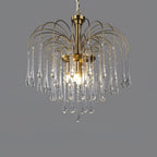 Clear crystal drops taper to fine points on this Clérachic pendant, lit against a dark grey backdrop.