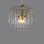 Clear crystal drops on this Clérachic pendant are lit against a plain dark grey background.