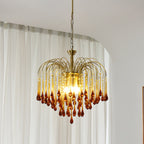 This Clérachic pendant's caramel crystal drops glow warm beside a sheer curtain in natural light.