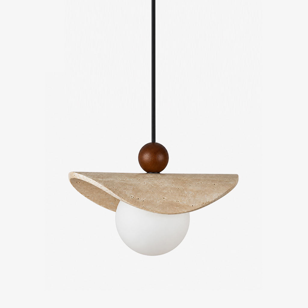 This Clérachic pendant balances a travertine sail on a walnut bead above a glowing opal glass globe.