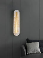 Genuine alabaster and brass sconce lighting a cozy interior corner