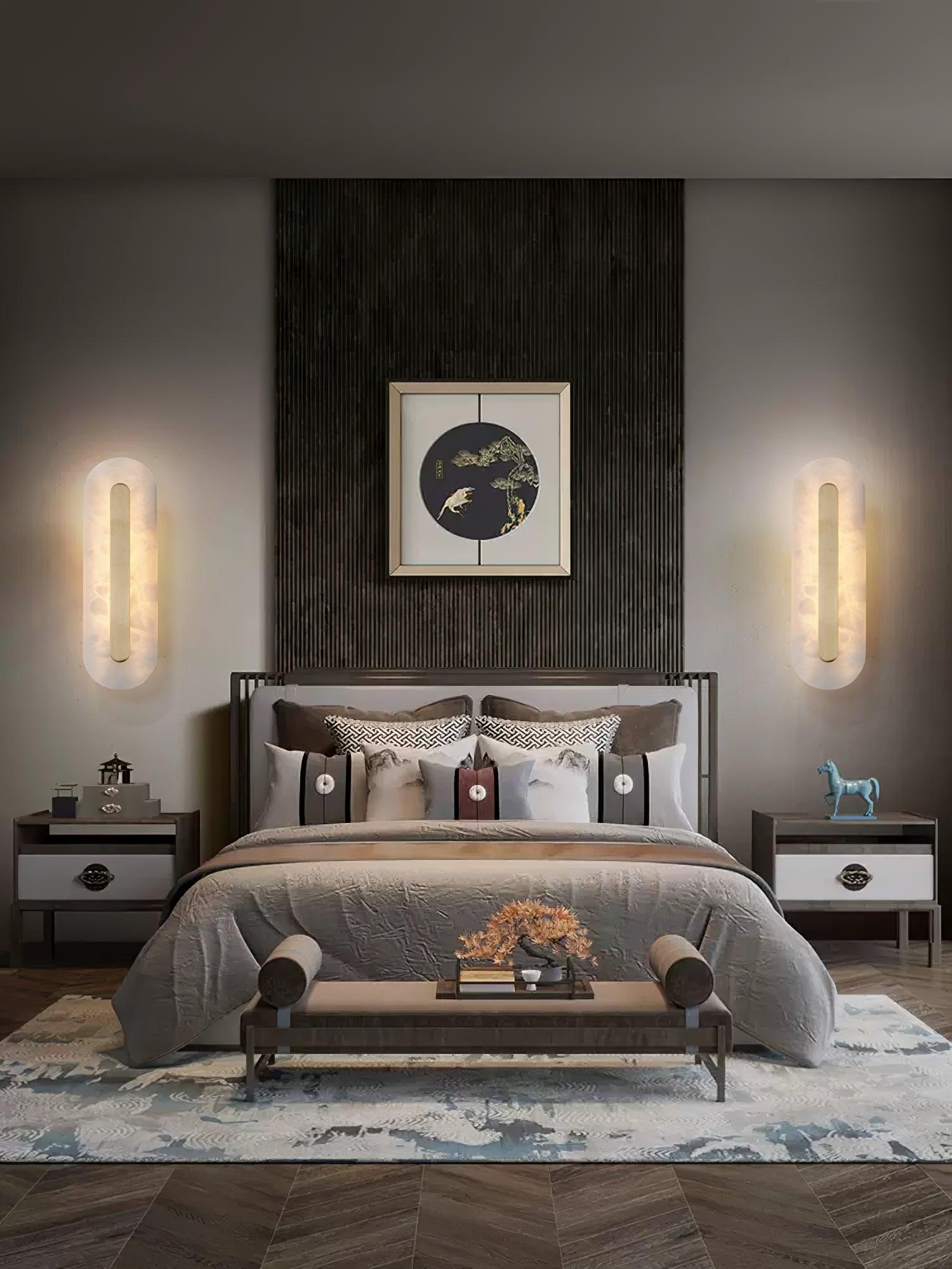 Alabaster wall light showing organic stone veining and brass trim