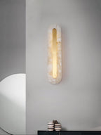 Genuine alabaster and brass sconce showing unique stone translucency