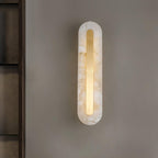 Clérachic selvia wall light viewed at a slight angle on a taupe wall beside dark timber shelving